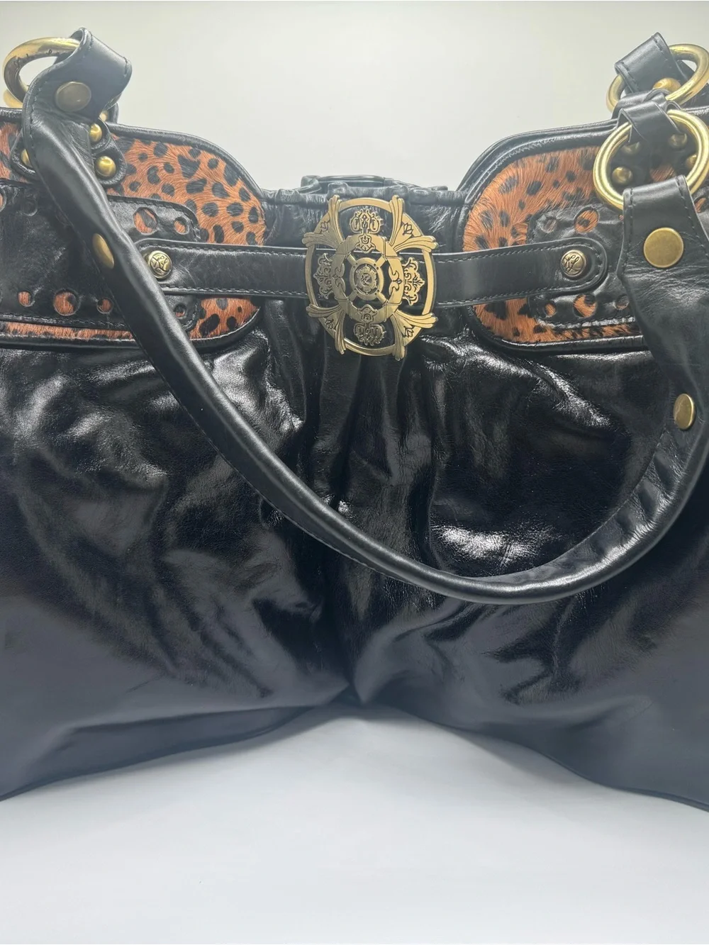 Kate Landry Black Leather Tote with Leopard Accent and Gold Emblem